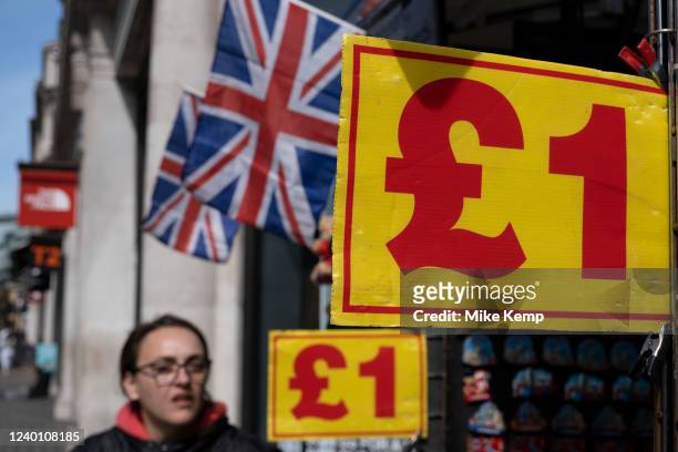 Souvenir stall selling souvenirs and flags for one pound which is illustrative of the cost of living crisis on 10th April 2022 in London, United...