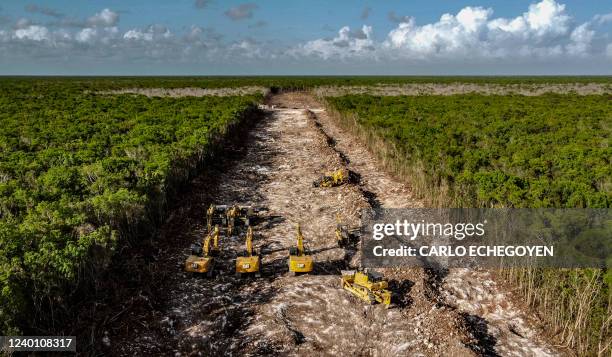 Aerial view showing the construction of the Mayan Train between Tulum and Playa del Carmen, Quintana Roo State, Mexico, on April 14, 2022. A Mexican...