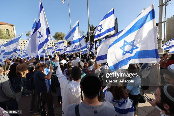 Number of far-right Israeli groups, holding Israeli flags, gather for "flag march" in West Bank on April 20, 2022. They were blocked by Israeli...