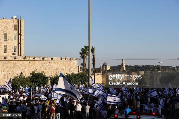 Number of far-right Israeli groups, holding Israeli flags, gather for "flag march" in West Bank on April 20, 2022. They were blocked by Israeli...