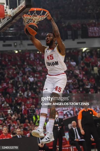 Monaco's US forward Donta Hall scores during the Euroleague playoff basketball match between Olympiacos Piraeus and AS Monaco at the Peace and...