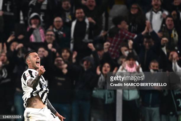 Juventus' Italian forward Federico Bernardeschi celebrates after opening the scoring during the Italian Cup semifinal, second leg football match...
