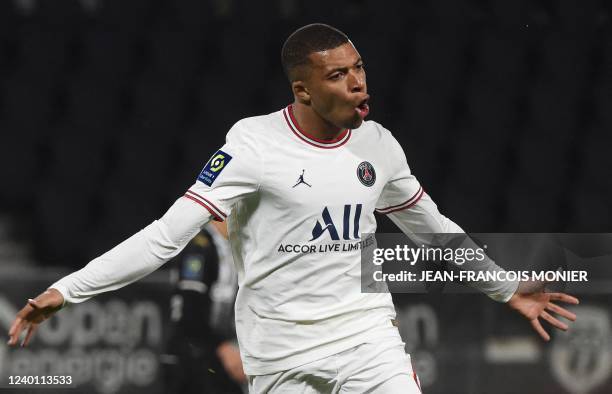 Paris Saint-Germain's French forward Kylian Mbappe celebrates scoring his team's first goal during the French L1 football match between Angers SCO...