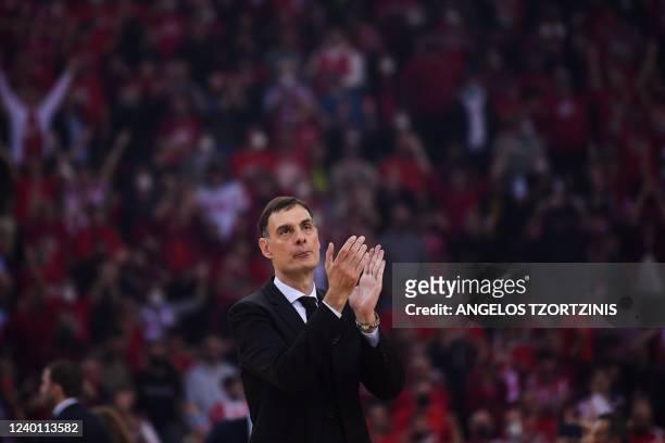 Olympiacos's Greek head coach Georgios Bartzokas celebrates their victroy after the Euroleague playoff basketball match between Olympiacos Piraeus...