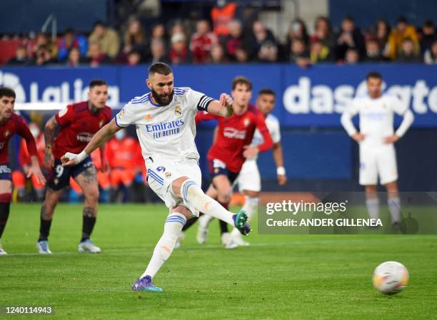 Real Madrid's French forward Karim Benzema takes a penalty kick during the Spanish League football match between CA Osasuna and Real Madrid CF at El...