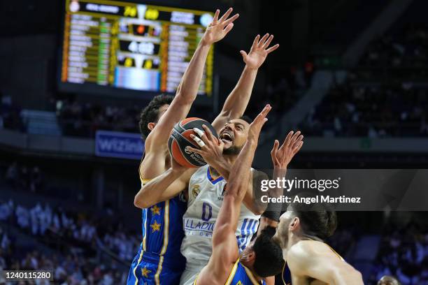 Nigel Williams-Goss, #0 of Real Madrid is challenged by Angelo Caloiaro, #4 of Maccabi Playtika Tel Aviv during the Turkish Airlines EuroLeague Play...