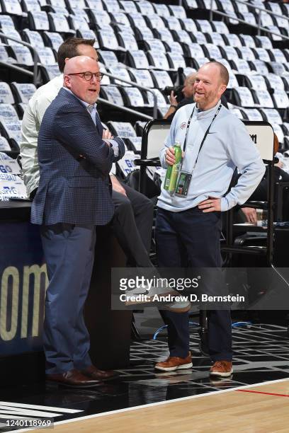 New Orleans Pelicans executive David Griffin and President Lawrence Frank of the LA Clippers look on before the game between the New Orleans Pelicans...