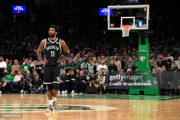 Kyrie Irving of the Brooklyn Nets looks on during Round 1 Game 2 of the 2022 NBA Playoffs against the Boston Celtics on April 20, 2022 at the TD...