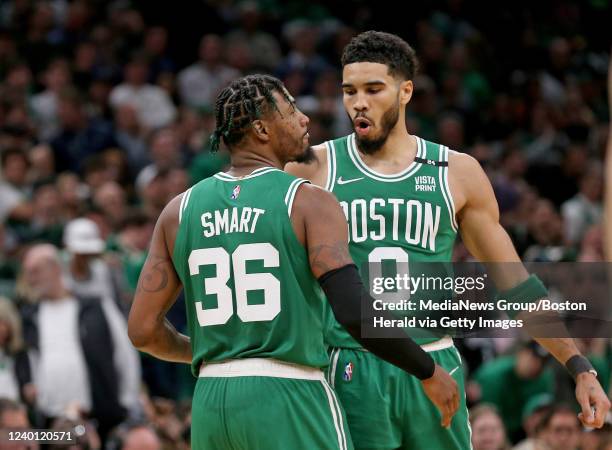 April 20: Marcus Smart and Jayson Tatum of the Boston Celtics celebrate during the second half of Round 1 Game 2 of the 2022 NBA Playoffs against the...