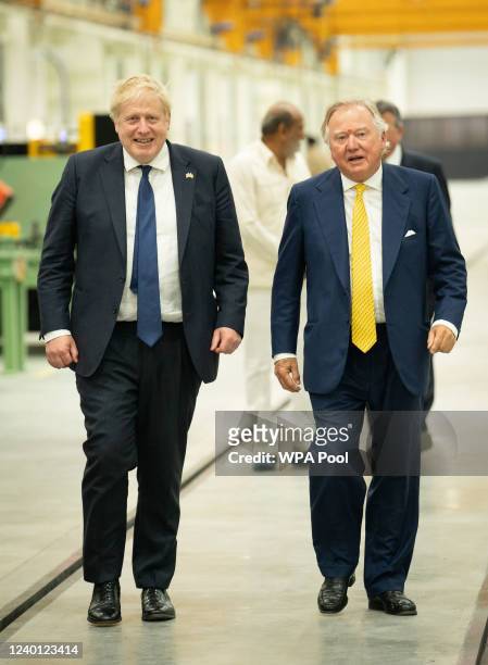 Prime Minister Boris Johnson with Lord Bamford, chariman of JCB, at the new JCB Factory in Vadodara, Gujarat, during his two day trip to India on...