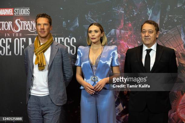 Benedict Cumberbatch, Elizabeth Olsen and Sam Raimi attend the "Doctor Strange In The Multiverse Of Madness" photo call at Ritz Carlton on April 21,...
