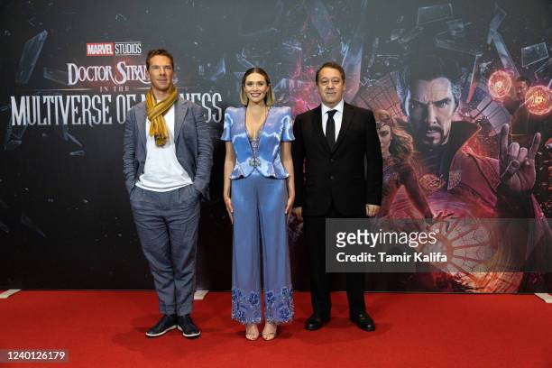 Benedict Cumberbatch, Elizabeth Olsen and Sam Raimi attend the "Doctor Strange In The Multiverse Of Madness" photo call at Ritz Carlton on April 21,...