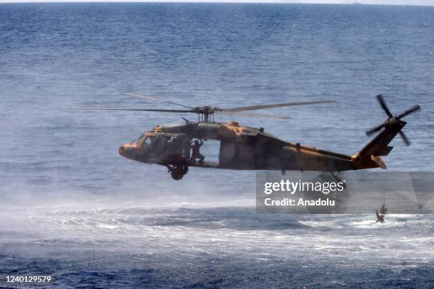 Helicopter flies during the Distinguished Observer Day of Blue Homeland military exercise in Mugla, Turkiye on April 21, 2022. The military exercise...