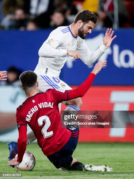 Nacho Fernandez of Real Madrid, Nacho Vidal of CA Osasuna during the La Liga Santander match between Osasuna v Real Madrid at the Estadio El Sadar on...