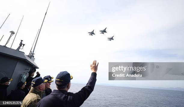 Turkish National Defense Minister Hulusi Akar greets the aircraft of the Naval Forces Command, the attack helicopters of the Land Forces Command and...