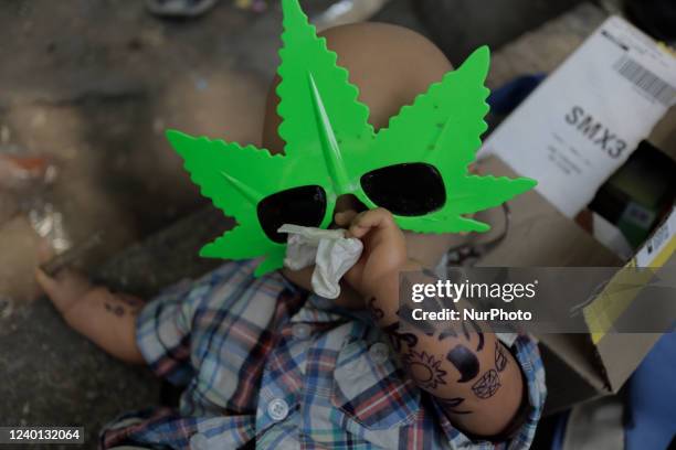 Dummy lying on the ground outside Plantón 420 outside the Senate of the Republic in Mexico City, during the commemoration of International Marijuana...