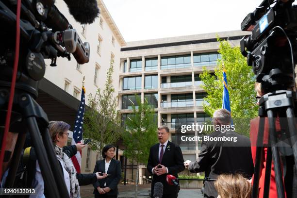 Valdis Dombrovskis, trade commissioner for the European Union , center, speaks to members of the media with Katherine Tai, U.S. Trade representative,...