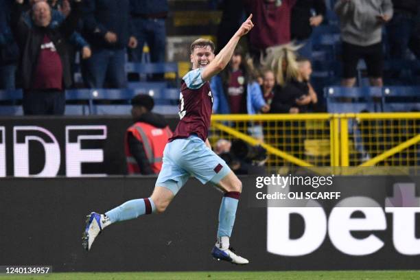 Burnley's Irish defender Nathan Collins celebrates after scoring their second goal during the English Premier League football match between Burnley...