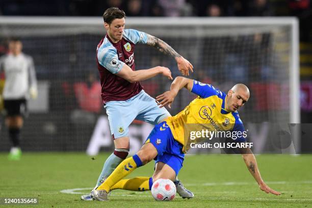 Burnley's Dutch striker Wout Weghorst vies with Southampton's Spanish midfielder Oriol Romeu during the English Premier League football match between...