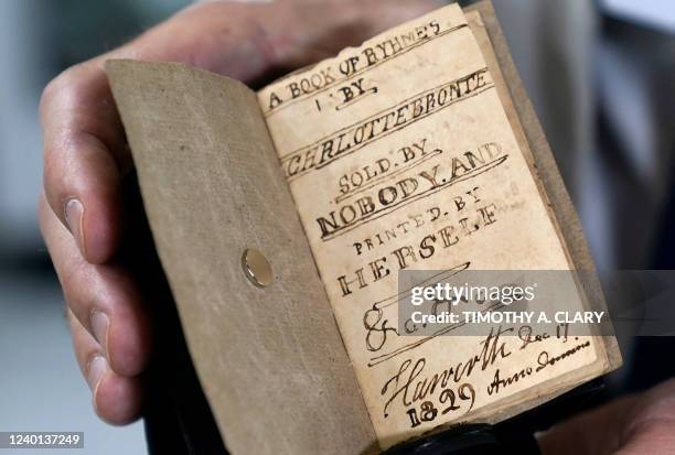 Miniature of the unpublished manuscript titled A Book of Rhymes by Charlotte Bronte, Sold by Nobody, and Printed by Herself" written by English...