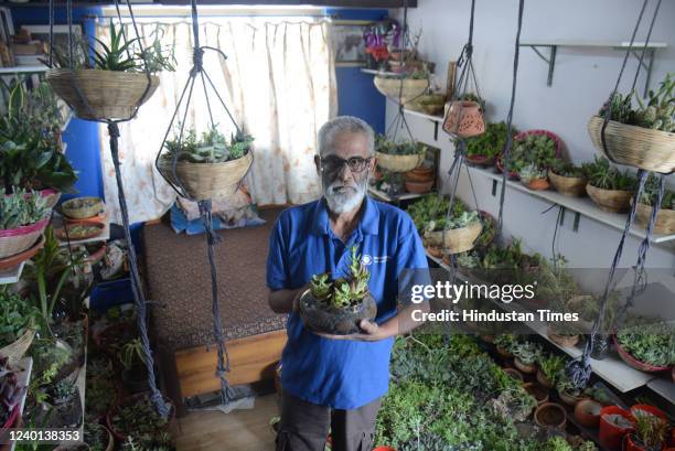 On the occasion of "World Earth Day", 62-year-old biomedical engineer Vijay Kumar Katti with collection of rare plants at his home at Balkum-Saket...