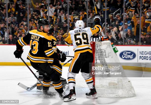 Jake Guentzel of the Pittsburgh Penguins celebrates his first period goal against the Boston Bruins at PPG PAINTS Arena on April 21, 2022 in...