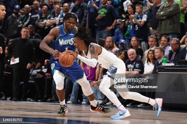 Anthony Edwards of the Minnesota Timberwolves plays defense on Ja Morant of the Memphis Grizzlies during Round 1 Game 3 of the 2022 NBA Playoffs on...
