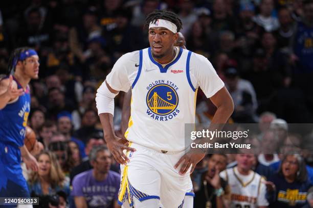 Kevon Looney of the Golden State Warriors looks on during the game against the Denver Nuggets during Round 1 Game 3 of the 2022 NBA Playoffs on April...