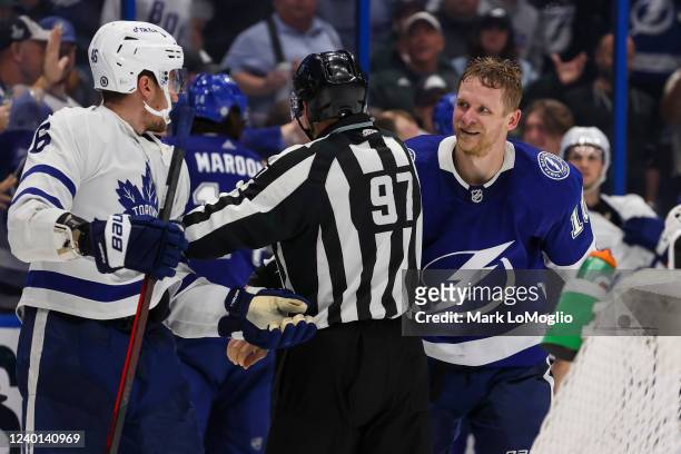 Corey Perry of the Tampa Bay Lightning in a post whistle scrum agains Ilya Lyubushkin of the Toronto Maple Leafs during the third period at Amalie...