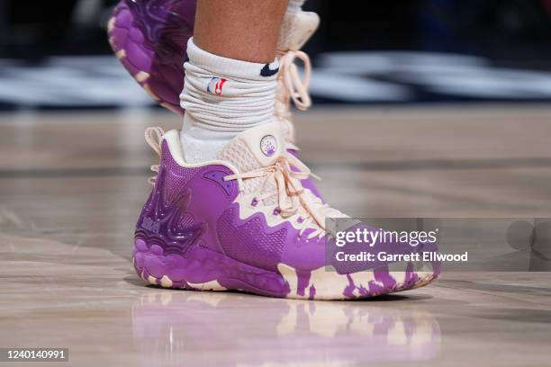The sneakers worn by Aaron Gordon of the Denver Nuggets during the game against the Golden State Warriors during Round 1 Game 3 of the 2022 NBA...