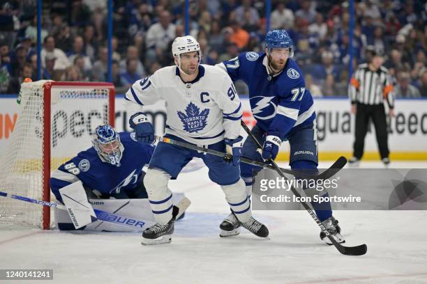 Toronto Maple Leafs Center John Tavares is defended by Tampa Bay Lightning Defenceman Victor Hedman as Tampa Bay Lightning Goalie Andrei Vasilevskiy...