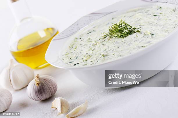 one bowl of tzaziki with dill - dill stock pictures, royalty-free photos & images