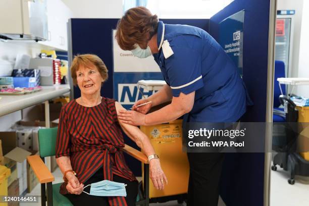 Margaret Keenan receives her spring Covid-19 booster shot at University Hospital Coventry on April 22, 2022 in Coventry, England. Mrs Keenan, known...