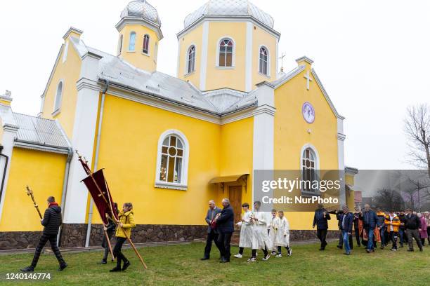 Ukrainian faithful attend Good Friday service in Greek-Catholic church in Nadyby, Lviv Oblast, Ukraine on April 22, 2022. As the Russian Federation...