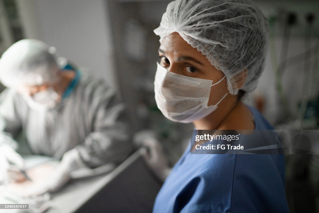 Portrait of female healthcare worker on operating room at hospital
