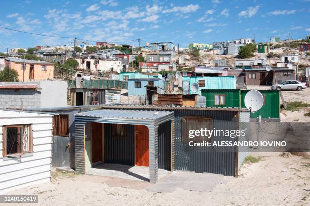 This general view shows housing structures in Khayelitsha, near Cape Town, on April 21, 2022.