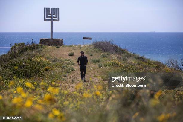 Aaron Wolf, grandson of camp founder Rabbi Alfred Wolf, walks through Inspiration Point at Camp Hess Kramer, that burned down during the 2018 Woolsey...