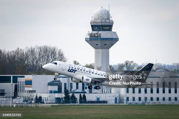 Polish Airlines Embraer E170STD at Chopin Airport in Warsaw, Poland on April 22, 2022. The strike and mass resignations of air traffic controllers...