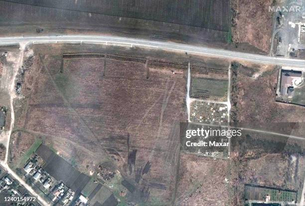 Maxar satellite imagery of the expansion of the mass grave site on the northwestern edge of Manhush, Ukraine. Sequence -- 5 of 5 images. Please use:...