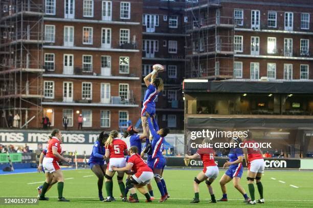 France's flanker Gaelle Hermet claims line-out ball during the Six Nations international women's rugby union match between Wales and France at...