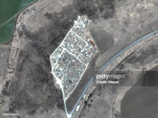 Maxar satellite imagery of another mass grave site expansion just outside of Vynohradne, Ukraine -- just east of Mariupol. Sequence -- 2 of 4 images....