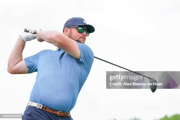 Former MLB Pitcher Jon Lester plays his shot from the ninth hole tee during round one of the ClubCorp Classic at Las Colinas Country Club on April...