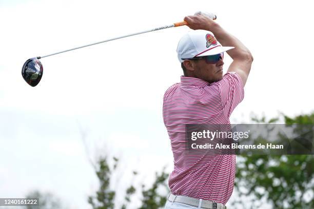 Former MLB Pitcher Clay Buchholz plays his shot from the ninth hole tee during round one of the ClubCorp Classic at Las Colinas Country Club on April...