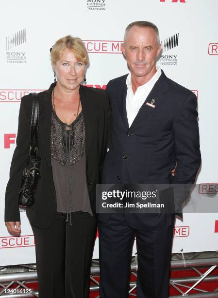 Actor Robert John Burke and wife attend the "Rescue Me" Season 7 series finale episode screening at the Ziegfeld Theatre on September 7, 2011 in New...