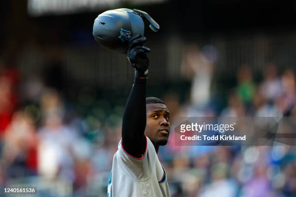 Jorge Soler of the Miami Marlins is greeted by fans on his first game back to Atlanta during the first inning of an MLB game against the Atlanta...