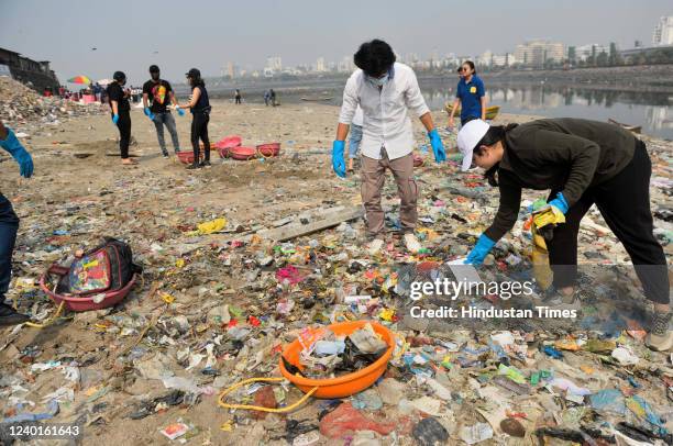 Volunteers clean Mahim Beach on the occasion of World Earth Day on April 22, 2022 in Mumbai, India.
