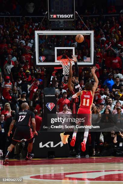 Trae Young of the Atlanta Hawks shoots the ball to win the game against the Miami Heat during Round 1 Game 3 of the NBA Playoffs on April 22, 2022 at...