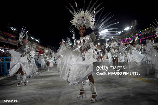 Members of Imperatriz Leopoldinense samba school perform during the first night of carnival parades at the Marques de Sapucai Sambadrome in Rio de...