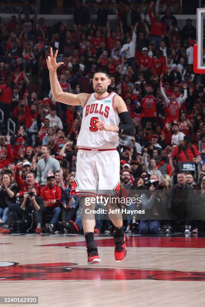 Nikola Vucevic of the Chicago Bulls celebrates a three point basket during Round 1 Game 3 of the 2022 NBA Playoffs against the Milwaukee Bucks on...