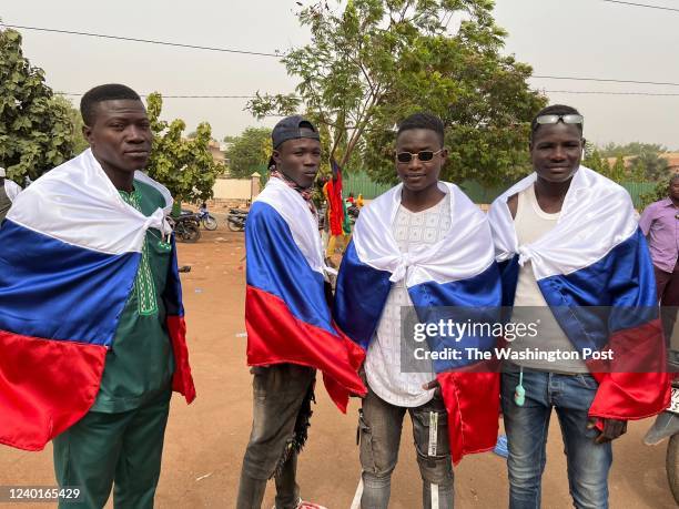 Young men take part in a pro-Russia rally in Ouagadougou, Burkina Faso, on March 27, 2022.